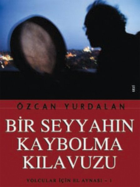 Bir Seyyahın Kaybolma Kılavuzu - Özcan Yurdalan kitap kapağı